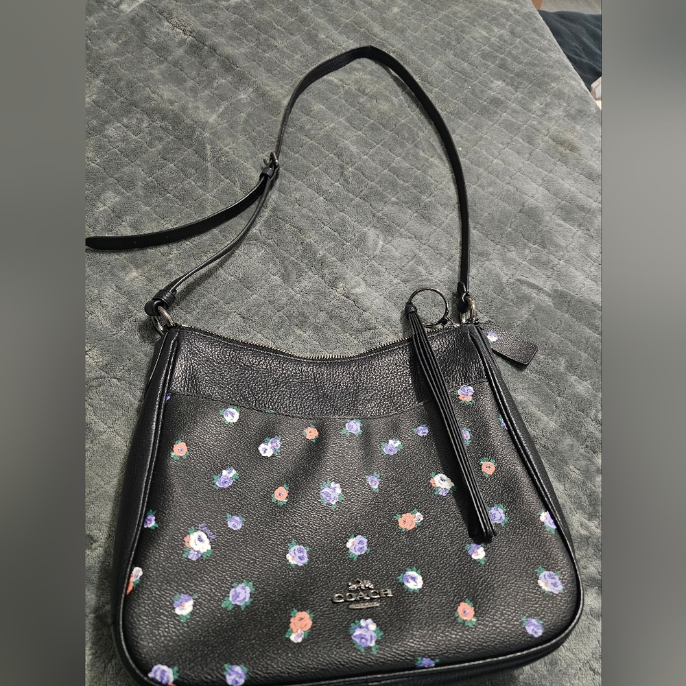 Black with flowers coach purse gently used